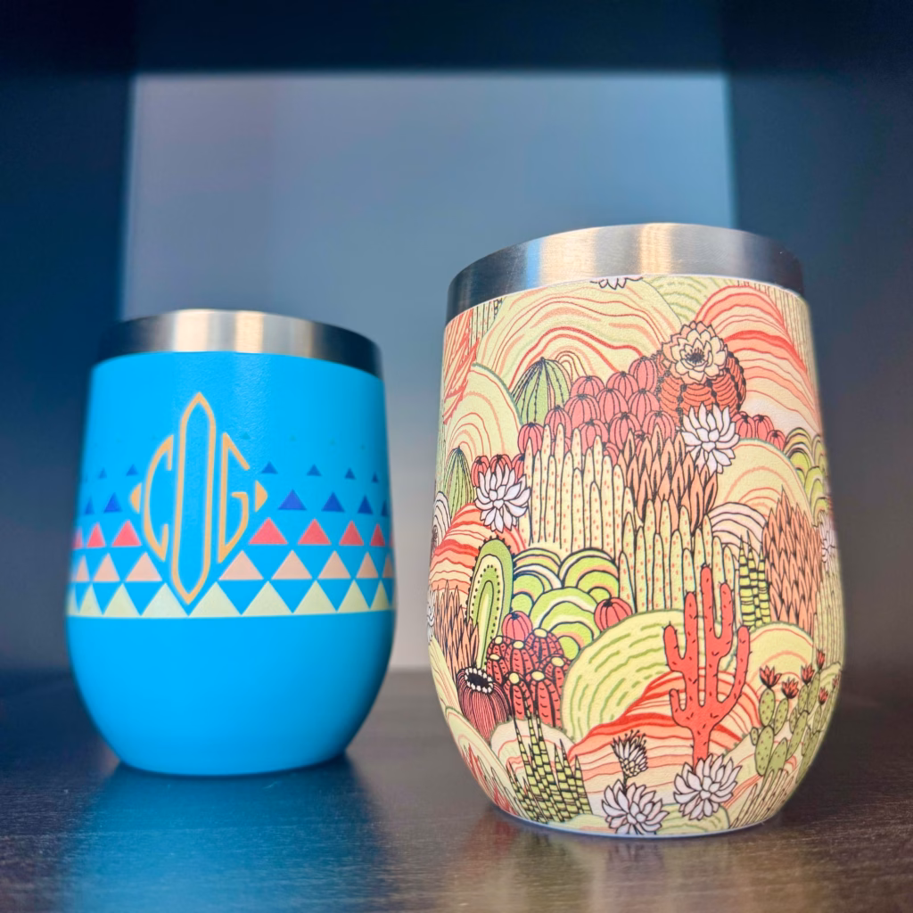 Two custom-printed wine cups; the cup on the right showcases flawless results achieved with a high gap printing feature, indicating successful printing on challenging or irregular surfaces.