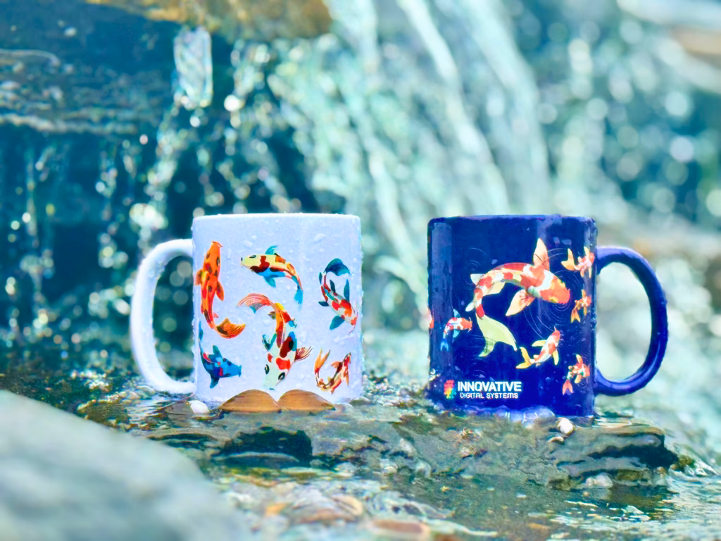 Beautifully customized ceramic mugs featuring detailed koi fish prints, highlighting the crisp, durable results possible with an advanced direct-to-object UV printer.